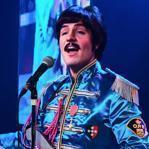 Paul Curatolo as Paul McCartney in ?RAIN: A Tribute to the Beatles.?