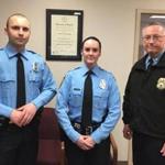 A photo provided by the Prince William County Police Department shows, from the left, Officer Steven Kendall, Officer and Ashley Guindon with Lt. Col. Barry Bernard, deputy chief of the Prince William County, Va., Police Department. Officer Ashley Guindon was shot and killed Saturday, Feb. 28, 2016, and two of her colleagues were wounded in a confrontation stemming from a call about an argument. Guindon and Kendall were sworn in on Friday, and Guindon was working her first shift with the Prince William County Police Department when she was killed. (Prince William County Police Department via AP)
