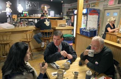 After the mayoral primary in 2013, Martin J. Walsh sat with his advisor Michael Goldman (right) and press secretary Kate Norton  in Dorchester restaurant.
