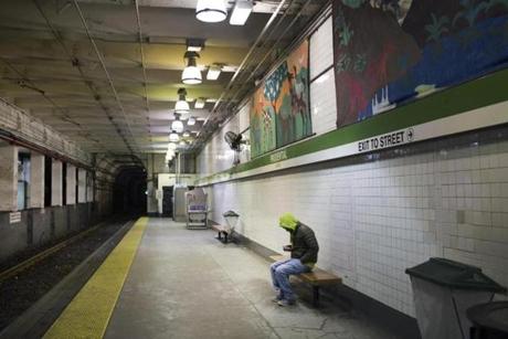 A passenger waited for the train to arrive at Prudential Station late at night last year.
