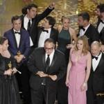 CAPTION ADDITION TO ADD MORE IDS - Nicole Rocklin, front row from left, Michael Sugar, Blye Pagon Faust, Steve Golin, and, second row from left, Mark Ruffalo, Josh Singer, Michael Rezendes, Rachel Mc Adams and Liev Schrieber appear on stage to accept the award for best picture for 