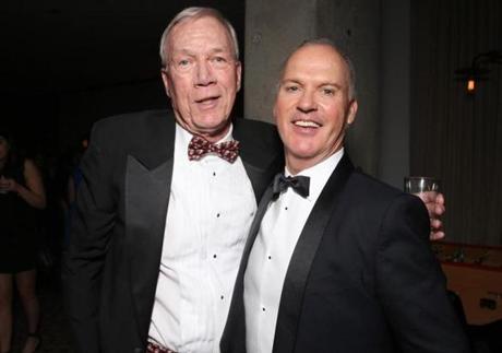 Walter ?Robby? Robinson (left) and Michael Keaton, who played Robinson in the movie ?Spotlight,? at an Oscar after-party in West Hollywood on Sunday night. (Todd Williamson/Getty Images for Participant Media)
