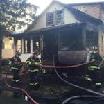 Firefighters took on a two-alarm fire on Dolloff Avenue in Beverly Tuesday morning.