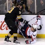 Bruins defenseman Zdeno Chara dropped Capitals forward T.J. Oshie during the first period. 