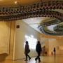 People walk underneath a piece by Ai Weiwei called, 'Snake Ceiling' at the Museum of Fine Arts in Boston last month. 