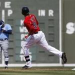 Boston Red Sox's Mookie Betts rounds the bases after hitting a solo home run in the first inning of a spring training baseball game against the Tampa Bay Rays in Fort Myers, Fla., Monday, March 7, 2016. (AP Photo/Patrick Semansky)