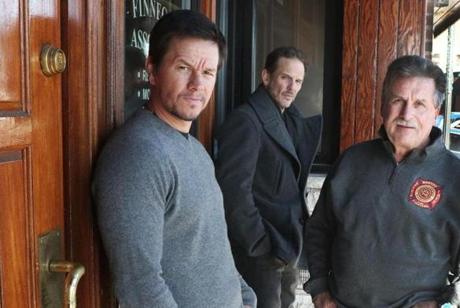 Actor Mark Wahlberg visiting the Eire Pub in Dorchester for lunch with director Peter Berg, middle, and a veteran Boston police detective, Dan Keeler, right, to talk about ?Patriots Day,? a movie being filmed in Weymouth. 
