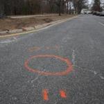 Paint marked the scene where an 18-year-old high school student was struck and killed while crossing a road in Milton. 
