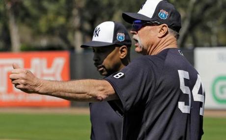 Rich Gossage (right), with former teammate and fellow instructor Willie Randolph in Yankees camp.
