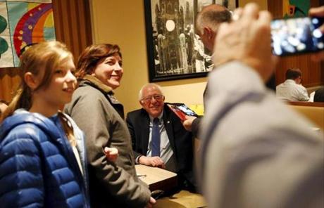 Democratic presidential candidate Bernie Sanders smiled as people took photos after he sat down for breakfast at Lou Mitchell?s restaurant and bakery in Chicago. 
