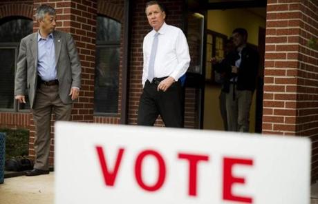 Republican presidential candidate John Kasich walked from his polling place in Westerville, Ohio after he cast his ballot in the primary election.
