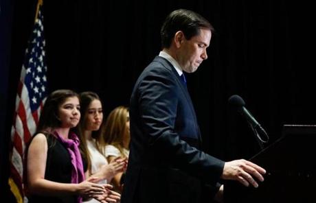 Marco Rubio, flanked by his family, spoke in Miami.
