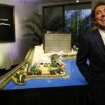 Steve Wynn stood in front of a model of his planned Everett casino.