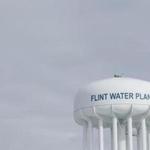 The Flint Water Plant tower is seen, Friday, Feb. 26, 2016 in Flint, Mich. Flint is under a public health emergency after its drinking water became tainted when the city switched from the Detroit system and began drawing from the Flint River in April 2014 to save money. The city was under state management at the time. (AP Photo/Paul Sancya)