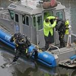 BOSTON, MA - 2/24/2016: Diving in......State Police dive team continue to search for missing Zach Marr under Zakim bridge and Charle River dam. (David L Ryan/Globe Staff Photo) SECTION: METRO TOPIC 25missingpic