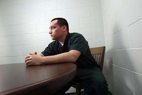 Marco Flores in the visiting room at Souza-Baranowski Correctional Center. 
