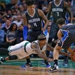 Celtics guard Isaiah Thomas dove for a ball being held by Orlando?s Evan Fornier in the third quarter.
