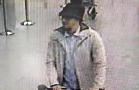 In this image provided by the Belgian Federal Police in Brussels on Tuesday, March 22, 2016, a man who is suspected of taking part in the attacks at Belgium's Zaventem Airport and is being sought by police. Bombs exploded at the Brussels airport and one of the city's metro stations Tuesday, killing and wounding scores of people, as a European capital was again locked down amid heightened security threats. (Belgian Federal Police via AP)
