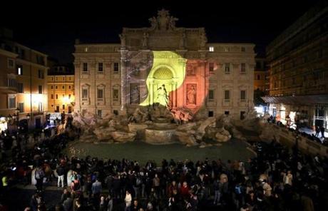 Rome?s Trevi fountain was illuminated in tribute to the Belgium victims.
