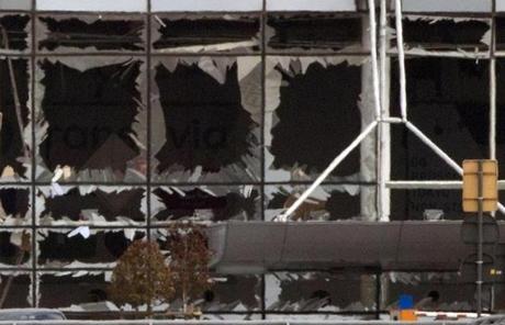 The blown out windows of Zaventem airport are seen after a deadly attack in Brussel.
