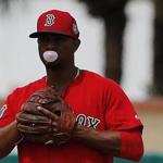 Boston Red Sox's Xander Bogaerts blows a chewing gum bubble during the fifth inning of an exhibition spring training baseball game against the St. Louis Cardinals, Monday, March 21, 2016, in Jupiter, Fla. (AP Photo/Brynn Anderson)