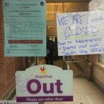 Signs on the Stop & Shop front door advised customers that the store was temporarily closed.