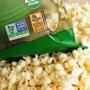 A label on a bag of popcorn indicates it is a non-GMO food product. 