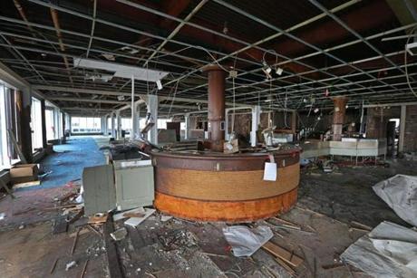 The old ship bar and dining area at Anthony?s Pier 4. By this time next year, the iconic building will be gone and construction on a nine-story condo building will be in full swing.
