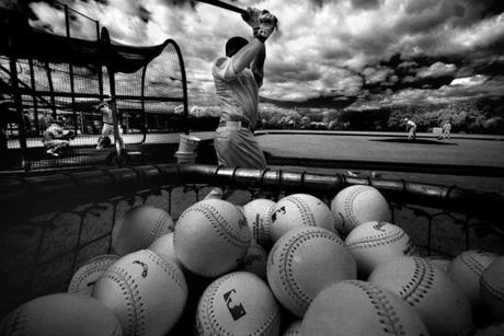 Fort Myers- Feb 28, 2016- globe photo by Stan Grossfeld- For Globe Magazine only- Red Sox jack of all trades Brock Holt loosens up before taking live batting practice at Fenway South. (Shot in infrared)

