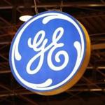 The logo of General Electric is pictured at the 26th World Gas Conference in Paris, France, in a June 2, 2015 file photo. General Electric Co said on Wednesday it will move its global headquarters to Boston and sell its offices in Fairfield, Connecticut, and Rockefeller Plaza in New York City. REUTERS/Benoit Tessier/Files