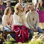 Michelle Monaghan (center) and Aaron Paul star as a married couple involved in a sect in ?The Path.?