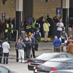 Police and rescue officials gathered outside the Greyhound Bus Station in Richmond, Va., where the shooting took place. 