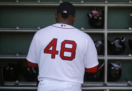 Boston Red Sox third baseman Pablo Sandoval stands in the dugout before a spring training baseball game against the Minnesota Twins in Fort Myers, Fla., Wednesday, March 2, 2016. (AP Photo/Patrick Semansky)
