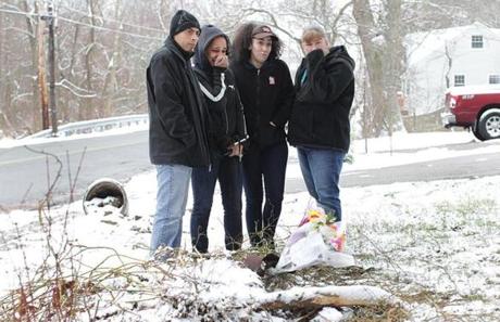 Dunkin? Donuts employees gathered Monday at the site of the accident that killed a couple who ran two of the stores.
