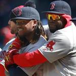 04/05/16: Cleveland, OH: Red Sox DH David Ortiz (right) embraces teammate Hanley Ramirez (left) during the pregame introductions. The Boston Red Sox visited the Cleveland Indians at Progressive Field for Opening Day of the 2016 Major League baseball season. (Globe Staff Photo/Jim Davis) section:sports topic:Red Sox