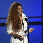 FILE - In this June 28, 2015, file photo, Janet Jackson accepts the ultimate icon: music dance visual award at the BET Awards at the Microsoft Theater in Los Angeles. Jackson is delaying her 