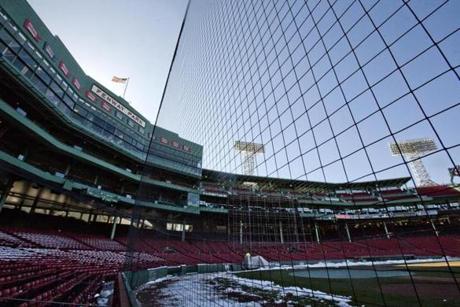 Boston, Ma-April 5, 2016-Globe staff photo by Stan Grossfeld-The new netting which extends from the home dugout to the visiting dugout at Fenway Park.
