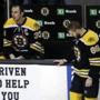Boston Bruins defensemen Zdeno Chara (33) and Kevan Miller (86) react near the bench after they lost an NHL hockey game against the Ottawa Senators, Saturday, April 9, 2016, in Boston. Ottawa won 6-1. (AP Photo/Elise Amendola)
