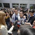Sun Wenlin and his partner, Hu Mingliang talked to reporters after losing their case.