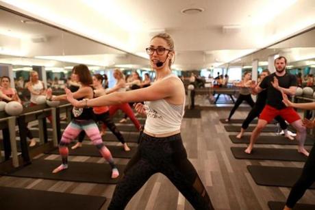 A barre class at Flywheel Gym at the Prudential Center.
