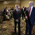 FILE - In this Aug. 25, 2015, file photo, Republican presidential candidate Donald Trump, right, walks with his campaign manager Corey Lewandowski after speaking at a news conference in Dubuque, Iowa. A Florida prosecutor's office plans to hold a news conference Thursday, April 14, 2016, amid reports that presidential candidate Donald Trump's campaign manager Lewandowski won't be prosecuted over a videotaped altercation with a female reporter. (AP Photo/, File)