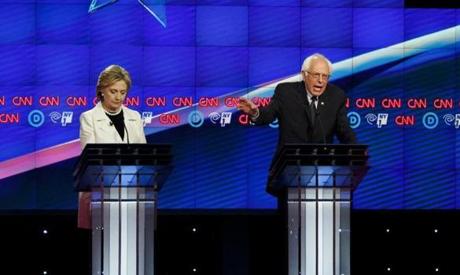 Bernie Sanders spoke as Hillary Clinton listened during the Democratic debate on Thursday night.
