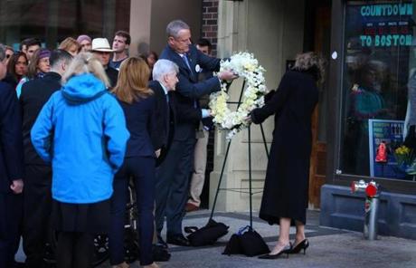04152016 Boston Ma Governor Charlie Baker and his wife during Wreath Laying ceremoney on Boylston Street with members of the Cambpell Family to honor Marathon Bombing victims. .Boston Globe/Staff Photographer Jonathan Wiggs
