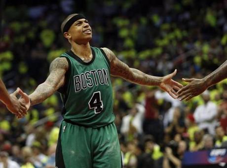 Atlanta, GA - 4/16/2016 - Boston Celtics Isaiah Thomas slaps hands with his teammates after making a free throw against the Atlanta Hawks during the second half of Game 1 in the first round of their NBA Playoff Series at Philips Arena in Georgia, Georgia April 16, 2016. Jessica Rinaldi/Globe Staff Topic: Celtics-Hawks Reporter: 
