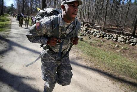 Army Specialist Adonis Carrasco, 23, of Westford, ran through the Minuteman National Historical Park with his 45-pound rucksack during Tough Ruck.

