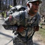 Army Specialist Adonis Carrasco, 23, of Westford, ran through the Minuteman National Historical Park with his 45-pound rucksack during Tough Ruck.