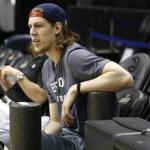 Atlanta, GA - 4/18/2016 - Boston Celtics Kelly Olynyk sits on the bench as his teammates practice at Philips Arena as they prepare for their second playoff game against the Hawks in Atlanta, Georgia April 18, 2016. Jessica Rinaldi/Globe Staff Topic: Reporter: 