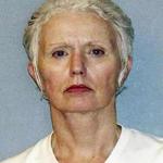FILE - This undated file photo provided by the U.S. Marshals Service shows Catherine Greig, longtime girlfriend of Whitey Bulger, captured with Bulger in Santa Monica, Calif., in 2011. Greig is serving an eight-year prison term for helping Bulger avoid capture, and faces additional prison time after pleading guilty to contempt in February 2016 for refusing to testify before a grand jury investigating who else may have helped Bulger. (U.S. Marshals Service via AP, File)