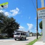 In this Aug. 29, 2014 photo, drivers enter the town of Waldo, Fla., where motorists can encounter many different speed limits in a roughly two-mile drive. The AAA auto club named the tiny town between Jacksonville and Gainesville one of only two ?traffic traps? nationwide. The other town is nearby Lawtey. Now Waldo is facing a scandal over its traffic tickets. (AP Photo/Jason Dearen)