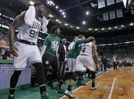 Celtics players began to celebrate late in overtime after Isaiah Thomas?s 3-pointer sealed the victory.
